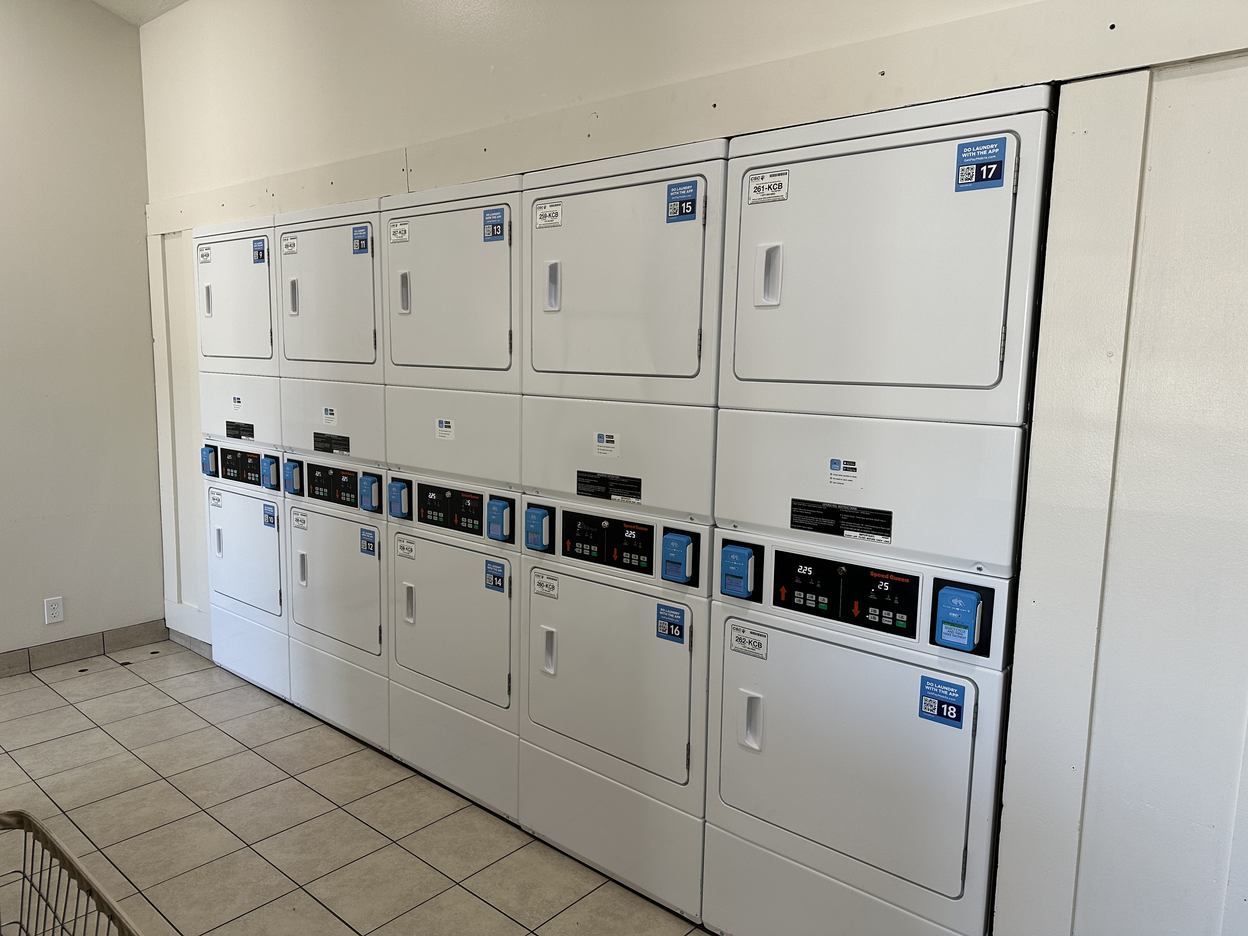 On-site laundry facility with dryers